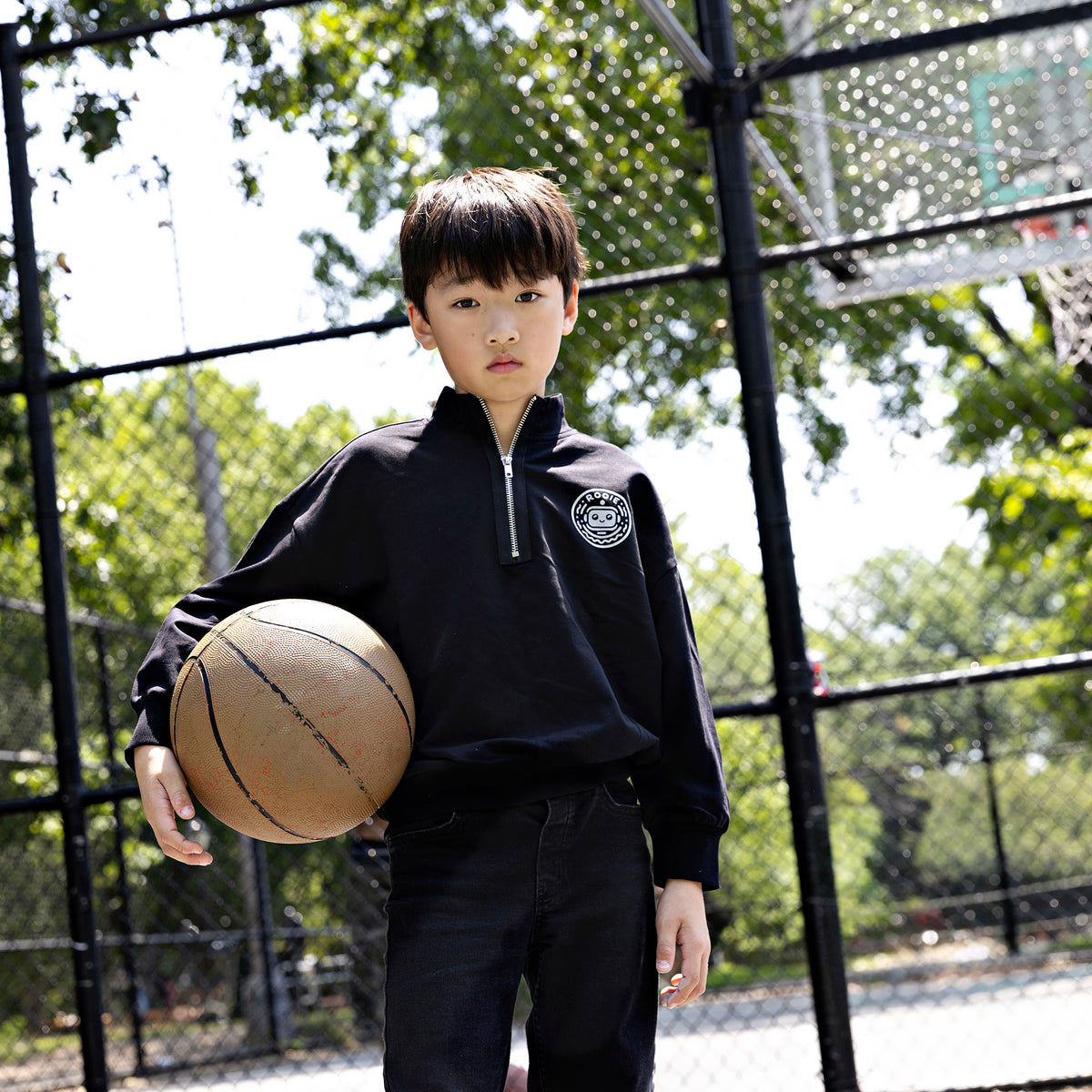 Rooie and Friends boys black half-zip sweatshirt with silver zipper and robot chest badge