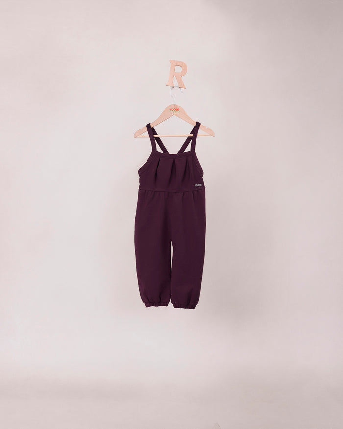 Rooie and Friends baby girls mauve pleated romper with cross-back straps